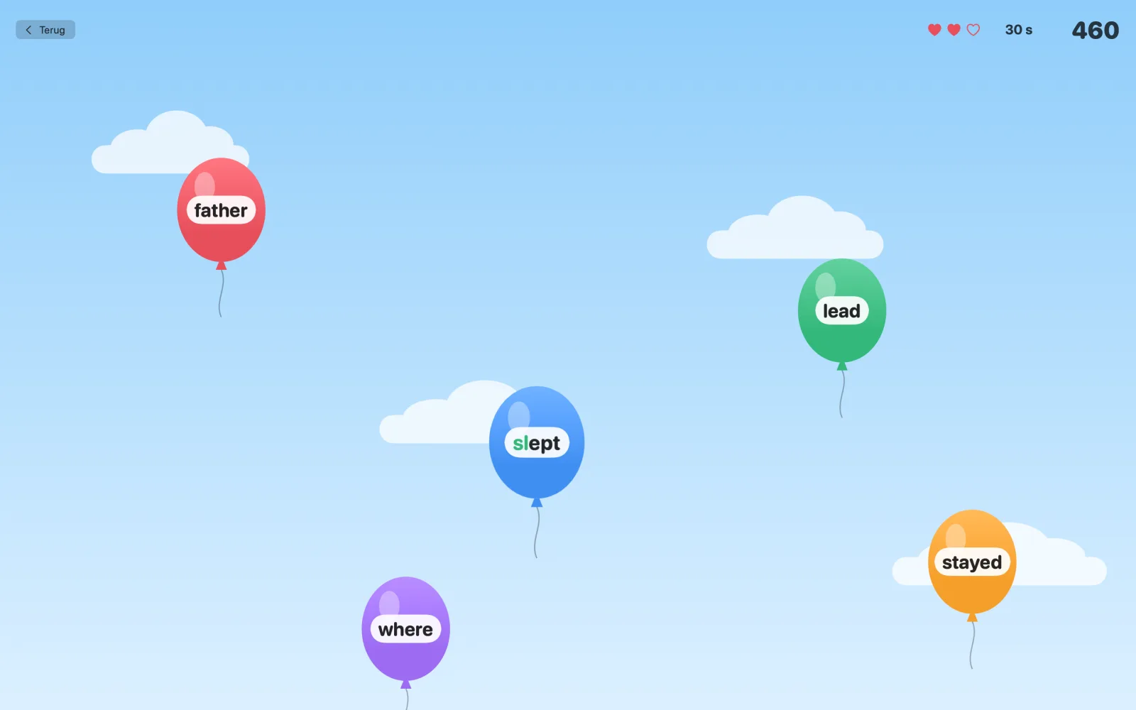 Het ballonnenspel: woorden zweven omhoog aan gekleurde ballonnen en knappen als ze getypt worden.